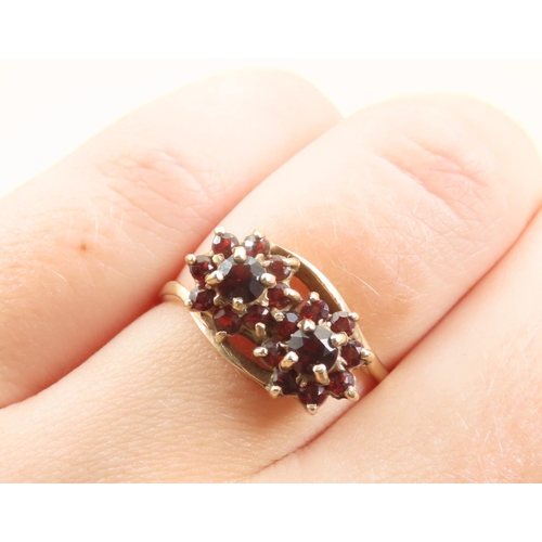 574 - Red Garnet Flower Motif Cluster Ring Mounted on 9 Carat Yellow Gold Band Size R and a Half