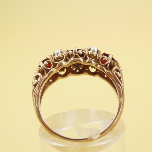 575 - Three Stone Red Garnet and Seed Pearl Ring Mounted on 9 Carat Yellow Gold Band Size P