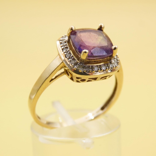 580 - Cushion Cut Amethyst and Diamond Halo Ring Mounted on 9 Carat Yellow Gold Band Size Q