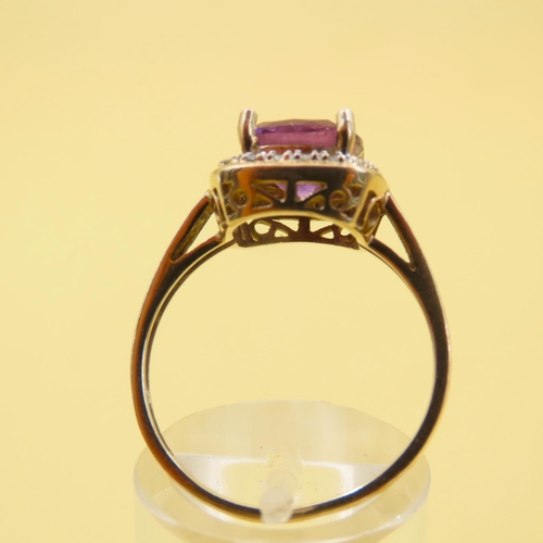 580 - Cushion Cut Amethyst and Diamond Halo Ring Mounted on 9 Carat Yellow Gold Band Size Q