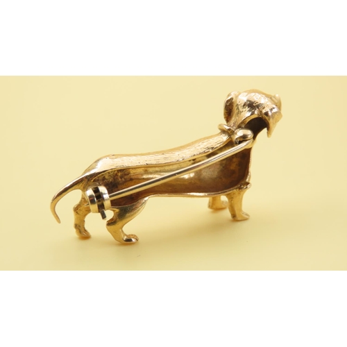 581 - Dachshund Motif 9 Carat Yellow Gold Brooch With Ruby Inset Eye Detailing 4cm Wide