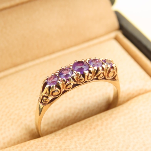 582 - Five Stone Amethyst Set Ring Mounted on 9 Carat Yellow Gold Band Size U