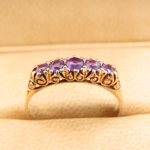 582 - Five Stone Amethyst Set Ring Mounted on 9 Carat Yellow Gold Band Size U