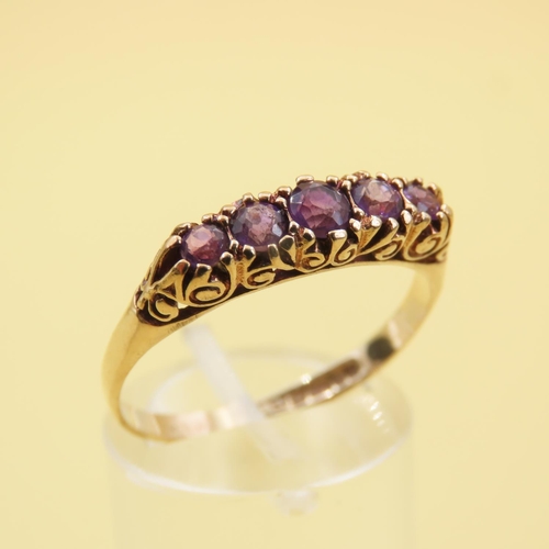 582 - Five Stone Amethyst Set Ring Mounted on 9 Carat Yellow Gold Band Size U