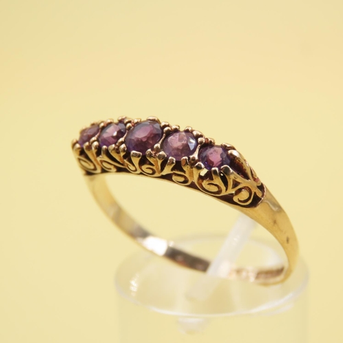 582 - Five Stone Amethyst Set Ring Mounted on 9 Carat Yellow Gold Band Size U