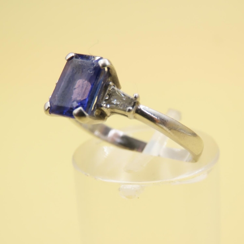 585 - Tanzanite Center Stone and Baguette Cut Diamond Ring Mounted on 18 Carat White Gold Band Size L