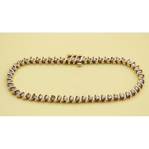 589 - Diamond Set Wave Design Tennis Bracelet Mounted in 18 Carat Yellow Gold 20cm Long