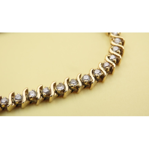 589 - Diamond Set Wave Design Tennis Bracelet Mounted in 18 Carat Yellow Gold 20cm Long