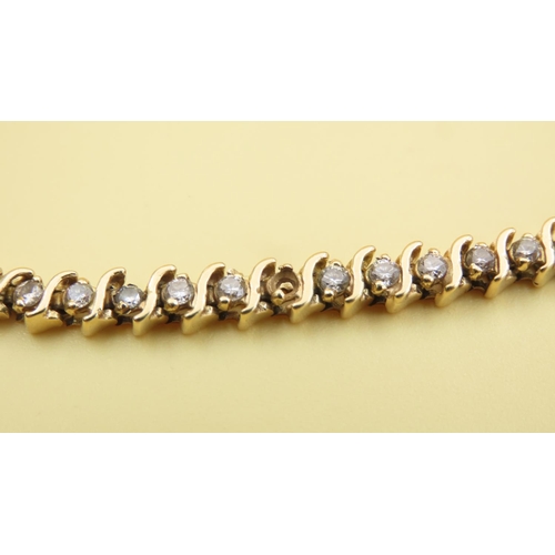 589 - Diamond Set Wave Design Tennis Bracelet Mounted in 18 Carat Yellow Gold 20cm Long