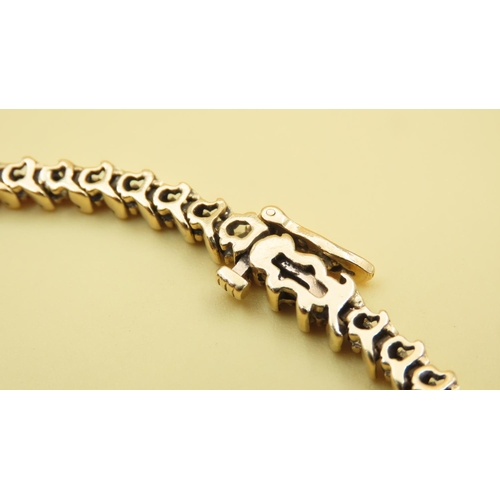 589 - Diamond Set Wave Design Tennis Bracelet Mounted in 18 Carat Yellow Gold 20cm Long