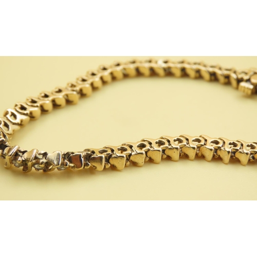 589 - Diamond Set Wave Design Tennis Bracelet Mounted in 18 Carat Yellow Gold 20cm Long