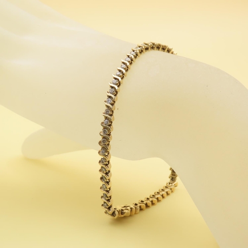 589 - Diamond Set Wave Design Tennis Bracelet Mounted in 18 Carat Yellow Gold 20cm Long