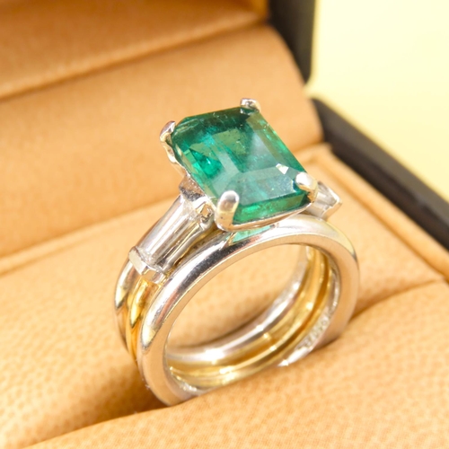 595 - Designer Emerald Solitaire Ring with Further Baguette Cut Diamonds to Shoulders Mounted on 18 Carat ... 