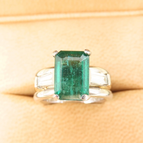 595 - Designer Emerald Solitaire Ring with Further Baguette Cut Diamonds to Shoulders Mounted on 18 Carat ... 