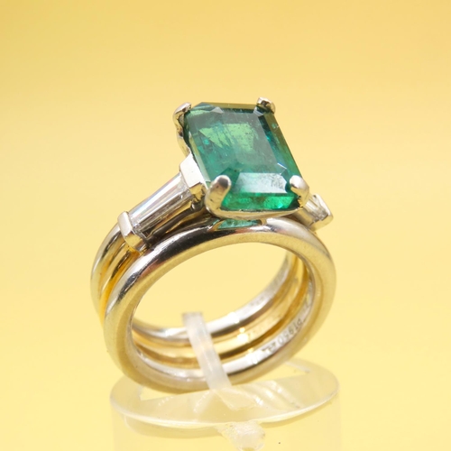 595 - Designer Emerald Solitaire Ring with Further Baguette Cut Diamonds to Shoulders Mounted on 18 Carat ... 