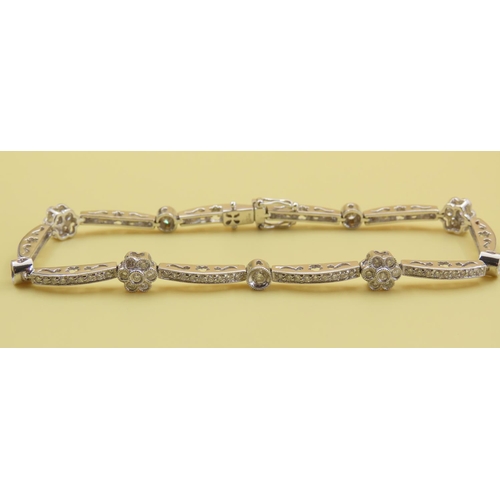Daisy Motif Diamond Set Bracelet Mounted 18 Carat White Gold Interlinking Form Attractively Detailed 19cm Long