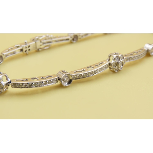 596 - Daisy Motif Diamond Set Bracelet Mounted 18 Carat White Gold Interlinking Form Attractively Detailed... 