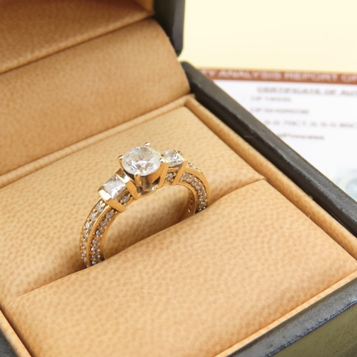 597 - Three Stone Diamond Ring With Further Inset Diamonds to Band Mounted in 18 Carat Yellow Gold Band Si... 