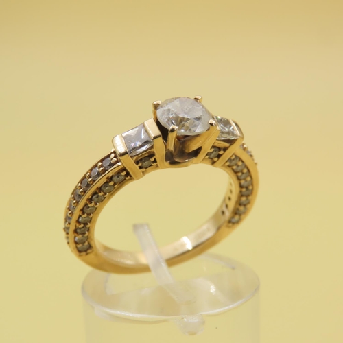 597 - Three Stone Diamond Ring With Further Inset Diamonds to Band Mounted in 18 Carat Yellow Gold Band Si... 