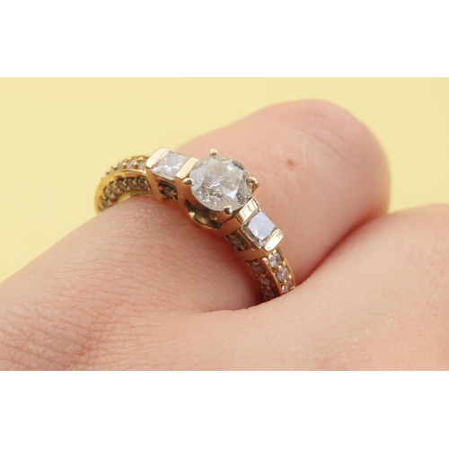 597 - Three Stone Diamond Ring With Further Inset Diamonds to Band Mounted in 18 Carat Yellow Gold Band Si... 