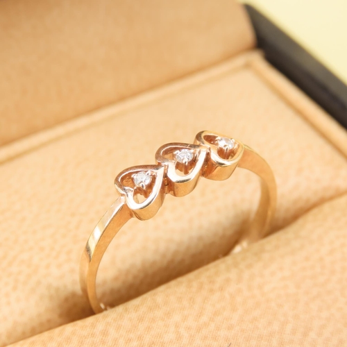 601 - Three Stone Heart Motif Diamond Ring Mounted on a 18 Carat Rose Gold Band Size Q