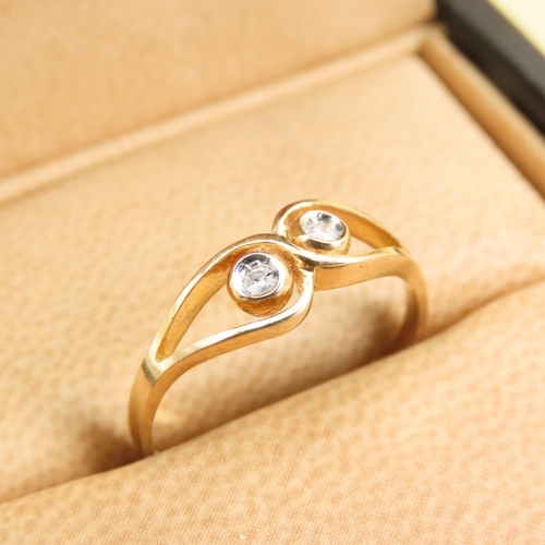 603 - Twin Stone Diamond Ring Mounted on a 19 Carat Yellow Gold Band Size O