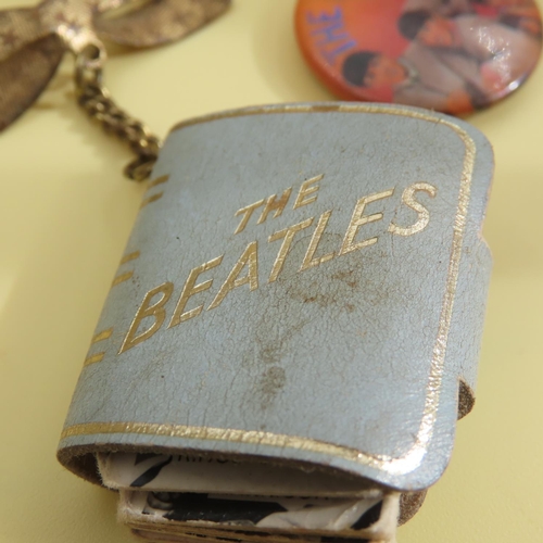 613 - Beatles Lapel Button and Photograph Holder Pendant with Beatles Photographs