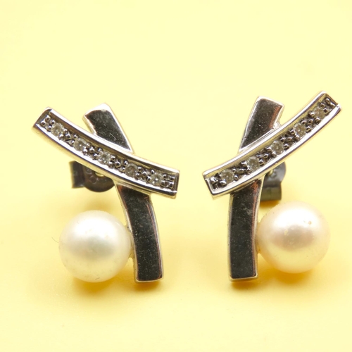 644 - Pair of Diamond and Pearl Set Crossover Detail Earrings Mounted on 9 Carat White Gold As New Unworn