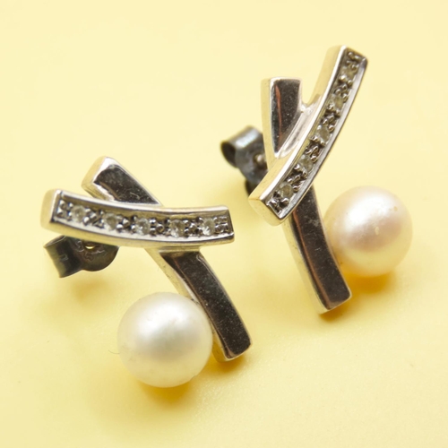 644 - Pair of Diamond and Pearl Set Crossover Detail Earrings Mounted on 9 Carat White Gold As New Unworn