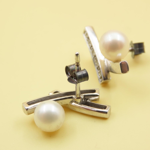 644 - Pair of Diamond and Pearl Set Crossover Detail Earrings Mounted on 9 Carat White Gold As New Unworn