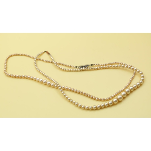 656 - Two Pairs of Graduated Form Pearl Necklaces