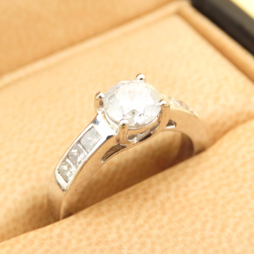 Diamond Solitaire Ring Mounted on 18 Carat White Gold Band Further Diamond Inset on Shoulders Ring Size K