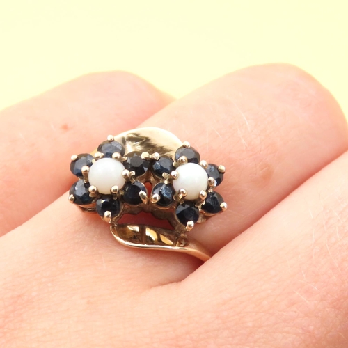 76 - Opal and Sapphire Twin Flower Motif Ring Mounted on 9 Carat Yellow Gold Band Size P
