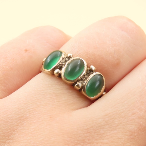 80 - Three Stone Polished Emerald Ring Mounted on 9 Carat Yellow Gold Band Size P and a Half