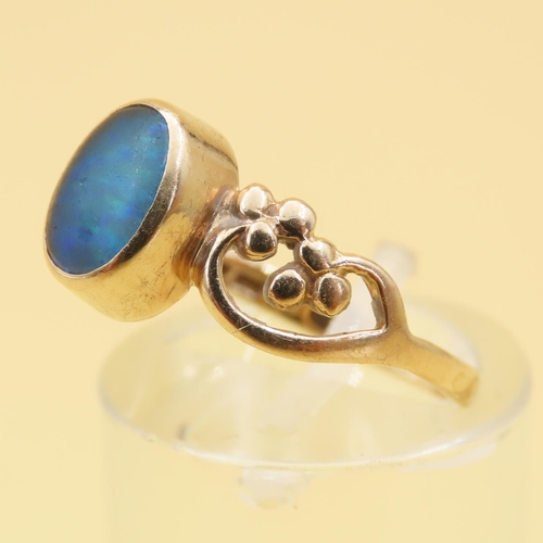 82 - Opal Ring with Flower Motif Shoulders Mounted on 9 Carat Yellow Gold Band Size N