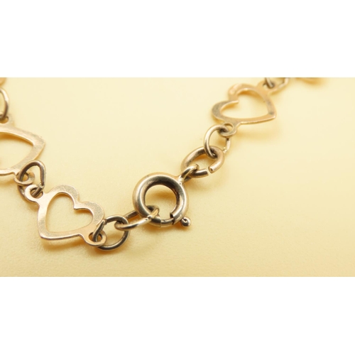 97 - 9 Carat Yellow Gold Linked Hearts Bracelet 19cm Long