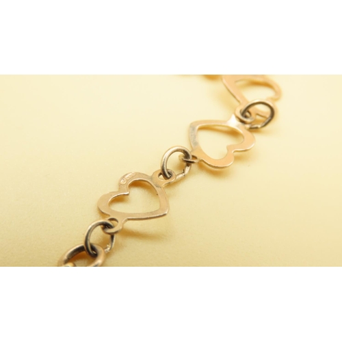 97 - 9 Carat Yellow Gold Linked Hearts Bracelet 19cm Long