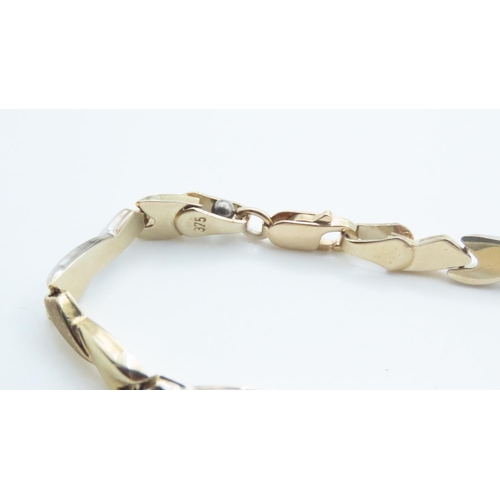 1002 - 9 Carat Yellow and White Gold Link Bracelet 19cm Long