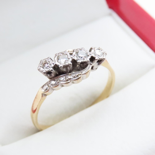 1005 - Four Stone Diamond Ring Mounted on 18 Carat Yellow Gold Band Ring Size Q and a Half