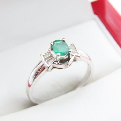 1007 - Emerald and Diamond Set Ring Mounted in 14 Carat White Gold Ring Size N