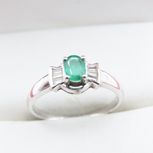 1007 - Emerald and Diamond Set Ring Mounted in 14 Carat White Gold Ring Size N