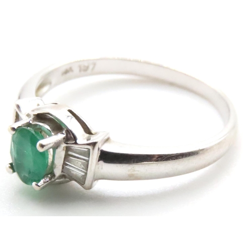 1007 - Emerald and Diamond Set Ring Mounted in 14 Carat White Gold Ring Size N