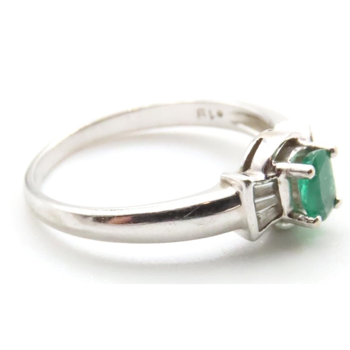 1007 - Emerald and Diamond Set Ring Mounted in 14 Carat White Gold Ring Size N