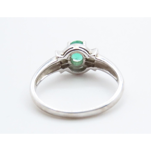 1007 - Emerald and Diamond Set Ring Mounted in 14 Carat White Gold Ring Size N