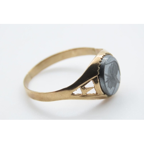 1015 - Panel Set Hematite Signet Ring Mounted on 9 Carat Yellow Gold Band Ring Size T