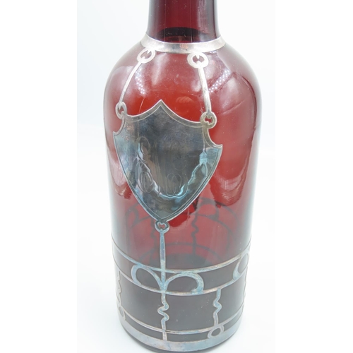 103 - Silver Mounted Decanter Bottle Motif Approximately 12 Inches High