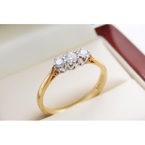 1038 - Three Stone Diamond Ring set in Platinum Mounted on 18 Carat Yellow gold Ring Size Q As New Unworn