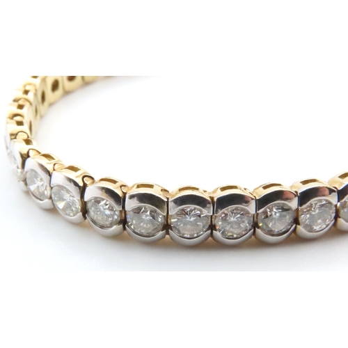 1051 - 18 Carat White and Yellow Gold Bezel Set Diamond Tennis Bracelet 19cm Long Total Diamond Weights 11 ... 