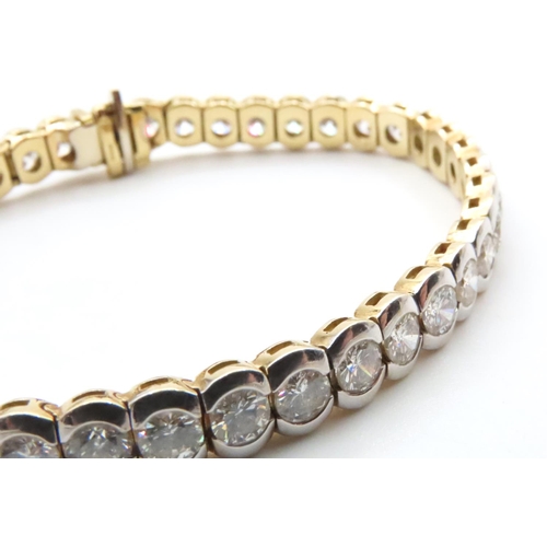 1051 - 18 Carat White and Yellow Gold Bezel Set Diamond Tennis Bracelet 19cm Long Total Diamond Weights 11 ... 