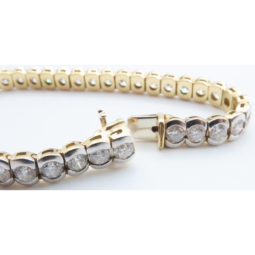 1051 - 18 Carat White and Yellow Gold Bezel Set Diamond Tennis Bracelet 19cm Long Total Diamond Weights 11 ... 